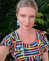 dopamine outfit with umbrella brooch