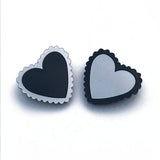 black and silver laser cut hearts