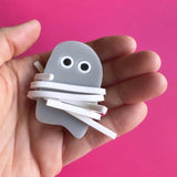 acrylic mummy rock brooch