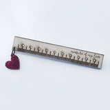 ruler and heart brooch 